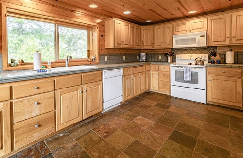 Agness Cabin | Secluded riverfront home with firepit, full kitchen, wonderful views & bunk room