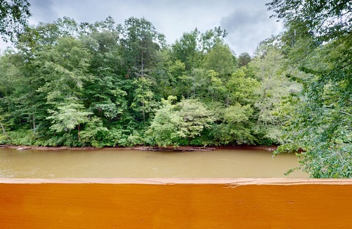 Whittier Cottage | Secluded riverside cabin great for fishing with two large decks