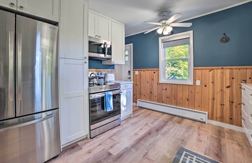 Suttons Bay Cottage | Secluded Suttons Bay Retreat w/Fire Pit!
