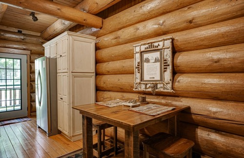 Eagle River House | Secluded waterfront log cabin with game room, dock, fire pit & deck