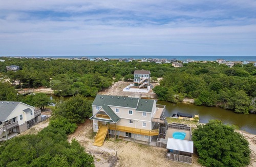 Carova Beach House | See the wild horses from your spacious 8-bedroom home in the 4x4 Carova Beach
