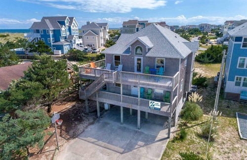 Ocean Isle Estates House | Semi-Oceanfront Home in Avon with Hot Tub, Smart TVs, and Basketball Hoop