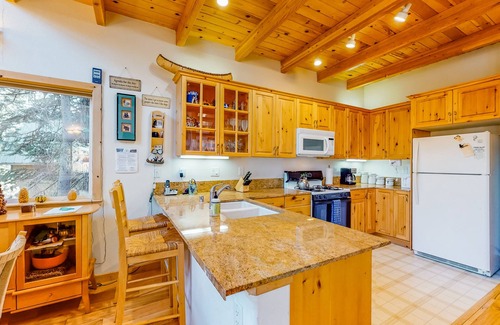 Serene Lakes House | Serene, dog-friendly cabin with private hot tub, wood stove