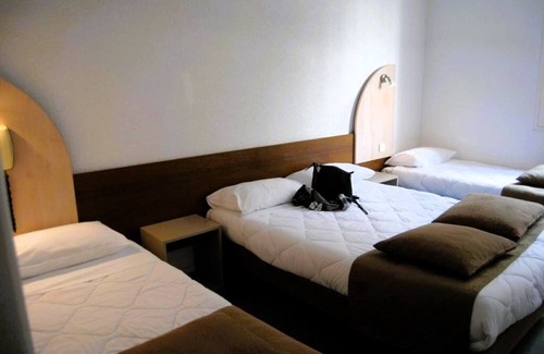 Lourdes Hotel | Serene Family Suite with Ample Space & Balcony - Free Parking