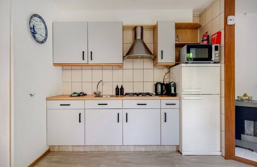 Nunspeet Ski Chalet | Serene Getaway: Charming Cozy Chalet with Generous Private Garden at the Veluwe.