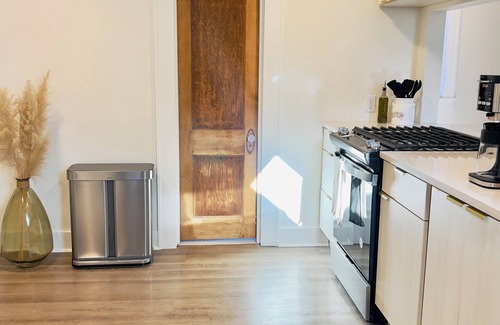 Historic Uptown House | Serene Green Historic Haven