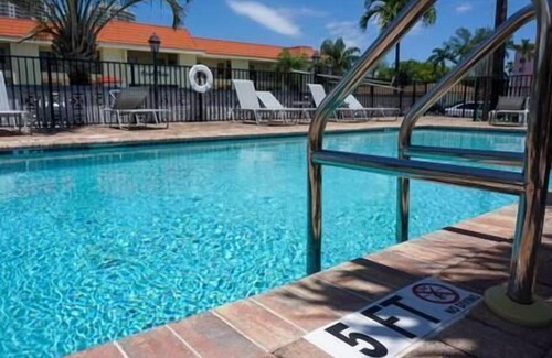 Palm Beach Shores Apartment | "Serenity at Seascape" Steps to the beach & Shops