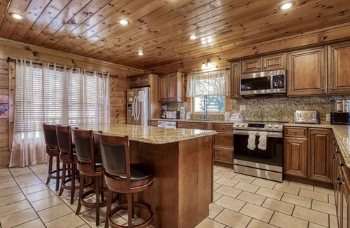 Sevierville Cabin | Serenity Mountain Pool Lodge, Theater Room, Sleeps 42, Indoor Pool!