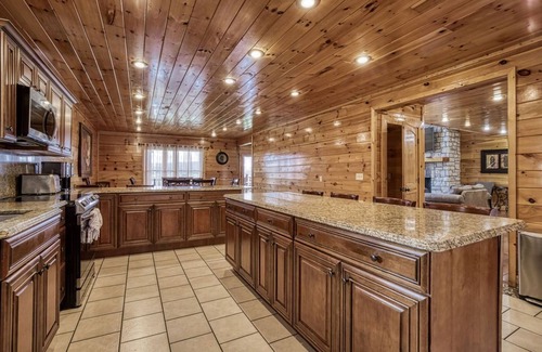 Sevierville Cabin | Serenity Mountain Pool Lodge, Theater Room, Sleeps 42, Indoor Pool!