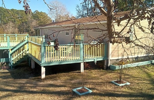 Sunset Beach House | "Serenity Now" Beautiful Lake Front property with Pool in Sunset Beach, NC