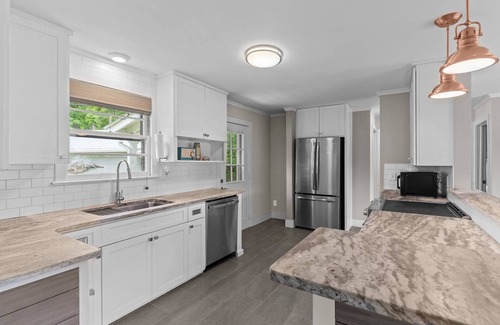 Ogden House | Serenity on Trinity | Hot Tub | Pets Welcome