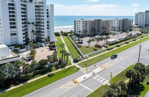 New Smyrna Beach Condo | Serenity Sands: Escape to the seaside resort of Oceanwalk in New Smyrna Beach