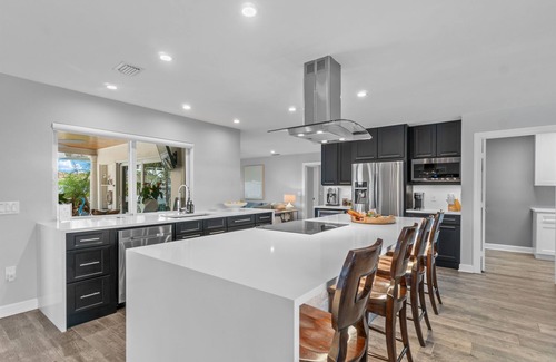Singer Island Villa | Seven Palms Waterfront - Private Dock, Heated Pool & Cabana - Walk to Beach!