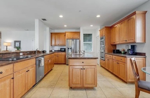 Meadows House | SEVENTH HEAVEN~Waterfront 5 BR, 4 Ba Townhome with Pool, Elevator & Dockage!