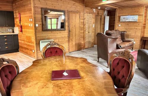 Llanybri Ski Chalet | Shrew Lodge-woodland Lodges-Hot Tub-Pembrokeshire-Tenby