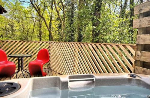 Llanybri Ski Chalet | Shrew Lodge-woodland Lodges-Hot Tub-Pembrokeshire-Tenby