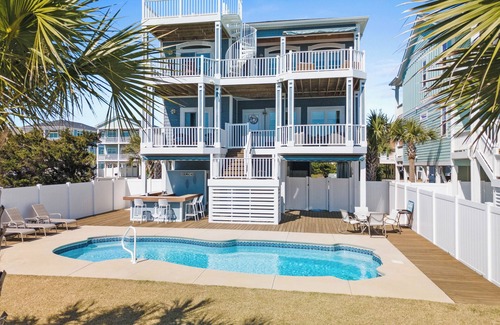 Holden Beach House | "Shrimply The Best" is better than all the rest! This gorgeous property features 5 Bedrooms, 5.5 Bathrooms, private Saltwater pool, Tiki Bar, and Elevator.