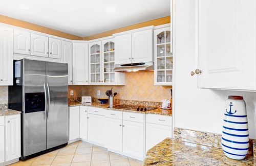 Sunset Island House | Side-by-side homes with bay views, resort pools, tennis, & gym - near beach