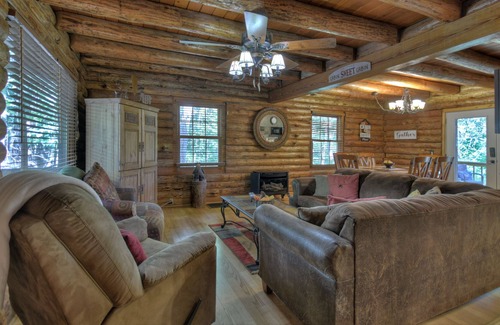 Eagle Mountain Cabin | Simpler Times is a real log cabin with kids game room and firepit.
