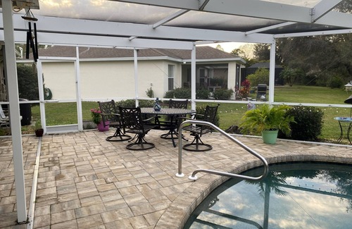 Deep Creek House | Single family, 4 bedroom, 2.5 bath, 2 car garage, lanai w/pool, outdoor shower.