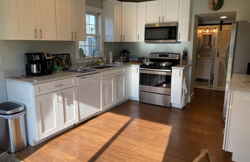 Fishing Creek House | Single family home with screened porch.