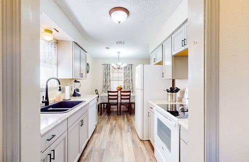 Stillwater House | Single-level home near OSU campus with fenced yard, patio, & grill
