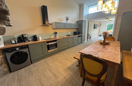 Plouneventer Apartment | Single-storey apartment with terrace in a 1520 mill