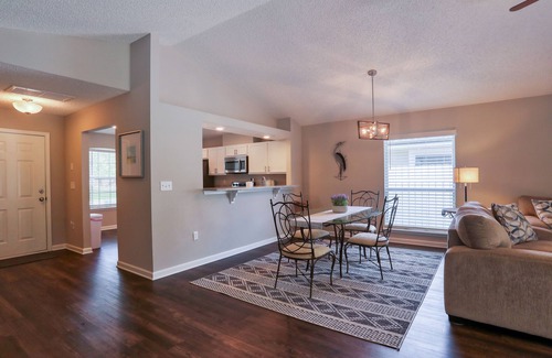 Sandalwood House | Single-story home with lagoon view, garden patio & easy drive to the beach