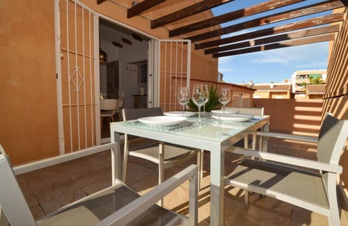 Punta Prima Apartment | Sit back and relax in a stylish space just a few steps from the beach! n