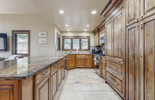 Warm Springs House | Ski-in/ski-out chalet with fireplace, furnished deck, & alfresco dining