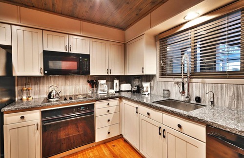 North Park City Condo | Ski-In/Ski-Out Chic Rustic Condo with Outdoor Hot Tubs and Pool! Year Round Fun!