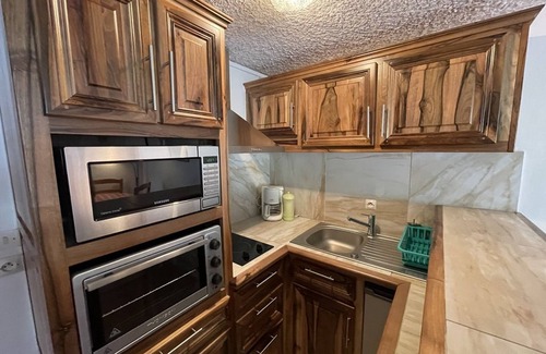 Laveissiere Apartment | Ski-in/Ski-out Studio, South-East Balcony, Sleeps 4, Shops Onsite