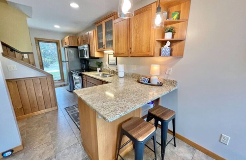 Lutsen Apartment | Ski in Ski out Townhome Indoor and outdoor pools hot tub fire pits and more