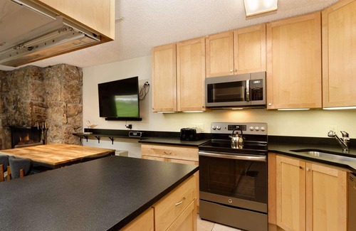 Snowmass Village Condo | Ski-In/Ski-Out Steps to Snowmass Lifts! Hot Tub, Fireplace, Covered Parking, Balcony Views & Winter!