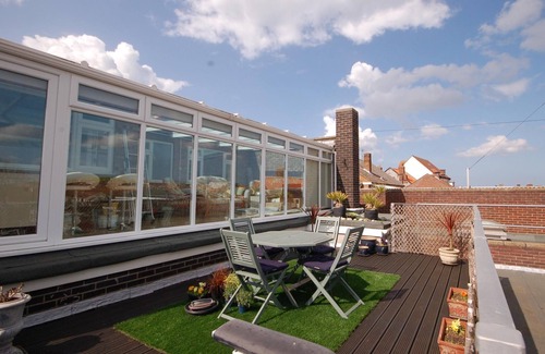 Sheringham Apartment | Sky View - Enjoy panoramic roof top views from the sunny conservatory or outside deck.