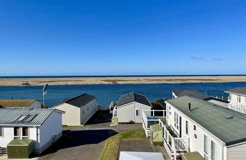 Wyke Regis House | Skydeck Holiday home with fabulous views over Chesil Beach and Portland Harbour