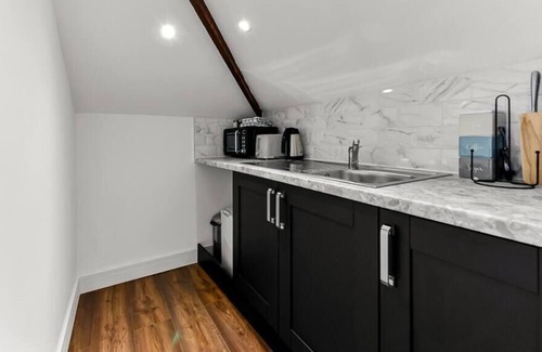 Chelmsford Apartment | Sleek and Modern Studio with Minimalist Vibe