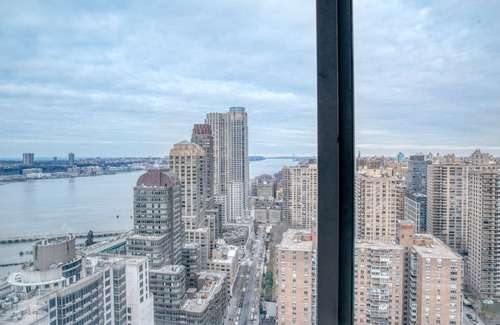 Lincoln Square Apartment | Sleek UWS 2BR w/Gym, Balcony & W/D, nr Central Park, by Blueground