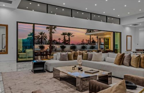 Indio House | Sleeps 25 2 Luxury Villas w Pool Spa Putting Green Bravo by AvantStay