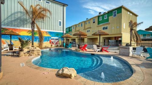Port Aransas House | Sleeps 33 4 Condos Walk to the Beach Resort-Style Pool Endless Summer Resort