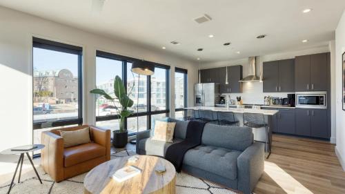 West End House | Sleeps 42 7 Modern Midtown Apartments w Gym, Pool, Walkable to Shops & Eats