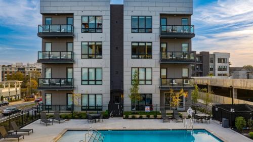 West End House | Sleeps 42 7 Modern Midtown Apartments w Gym, Pool, Walkable to Shops & Eats