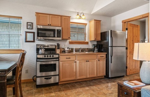 Dover Bay House | Slow down, just "Coast A While", and savor lakeside life at this perfect tranquil getaway.