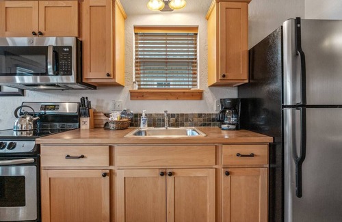 Dover Bay House | Slow down, just "Coast A While", and savor lakeside life at this perfect tranquil getaway.