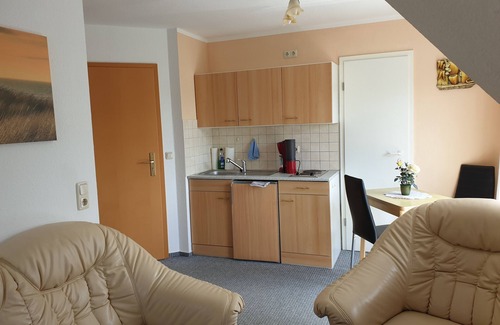 Wieck auf dem Darss Apartment | Small cozy vacation apartment with well-kept green property - Buhne II (upper floor)
