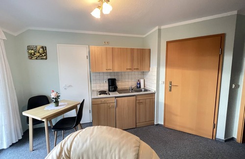 Wieck auf dem Darss Apartment | Small cozy vacation apartment with well-kept green property - Buhne IV (upper floor)