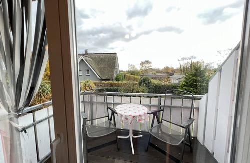 Wieck auf dem Darss Apartment | Small cozy vacation apartment with well-kept green property - Buhne IV (upper floor)