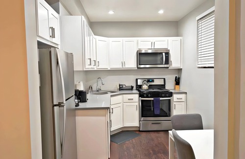 Boystown Apartment | Smart & Stylish 2-Bedroom Unit