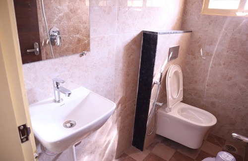 RR Nagar Hotel | Smilestay Karanji Paradise