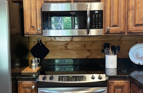 Houston House | Smith Lake Getaway: Lake front, custom log home with private dock and swim deck.